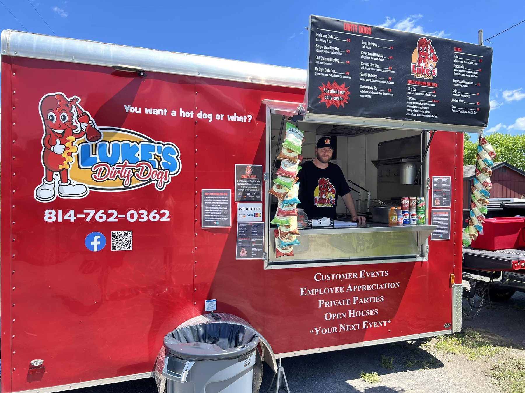 The red Luke’s Dirty Dogs truck with the serving window open